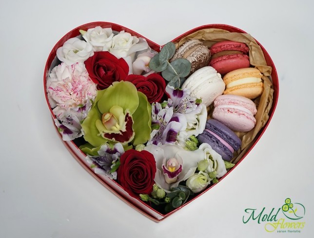 Red heart box with macaroons, orchids, roses, alstromeria and chrysanthemums photo